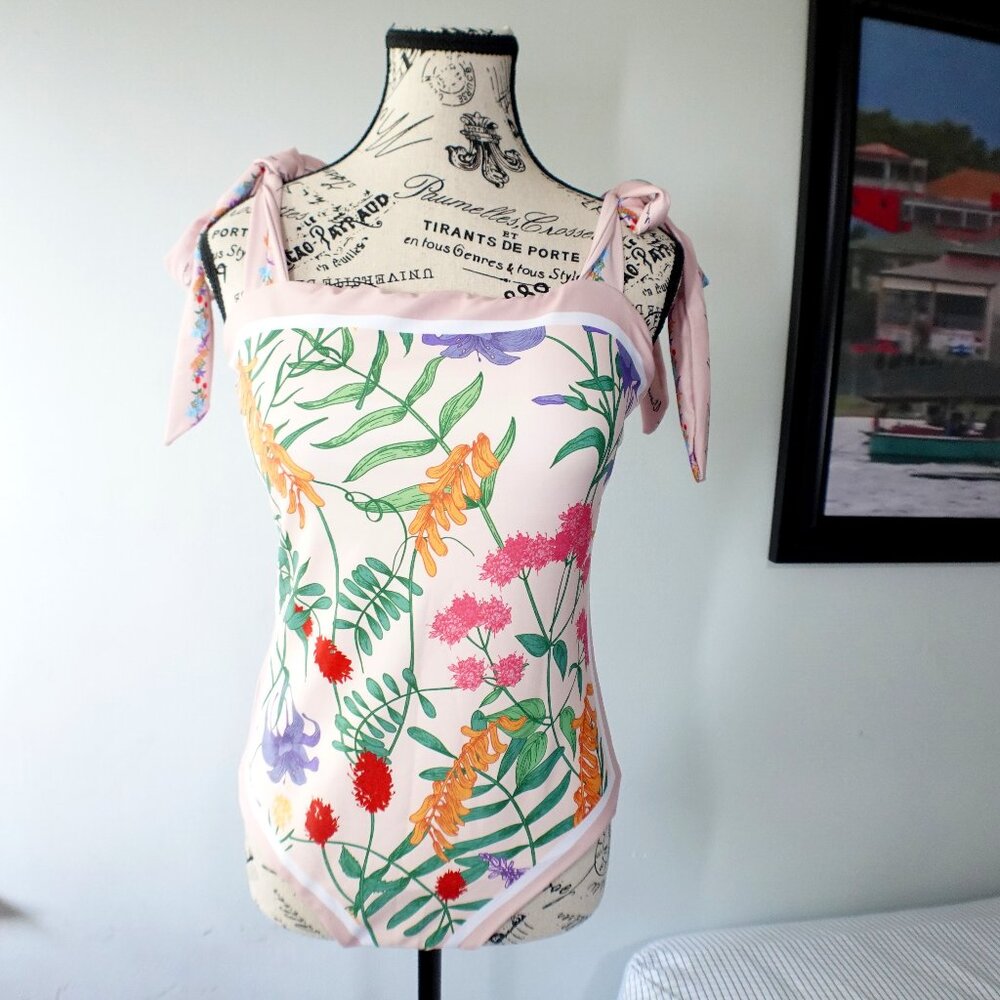 Women`s Bathing suit reversible floral pink & black size Medium New w/ tags